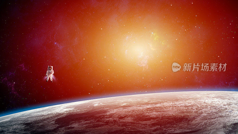 空间背景。宇航员与星云和太阳一起在地球上空飞行。
