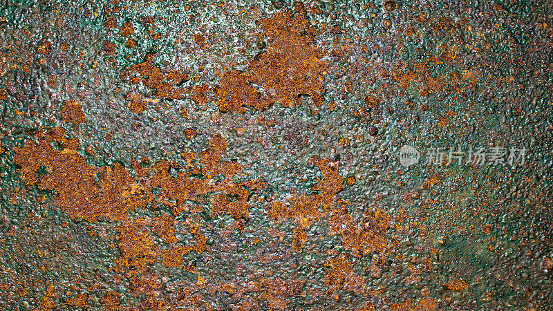 生锈的旧金属板，涂上绿色油漆
