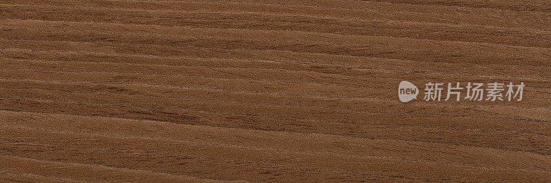 新的昂贵的坚果单板背景在普遍的棕色。天然木材纹理，图案长贴面。木质材料为独特的豪华内饰、外观设计。