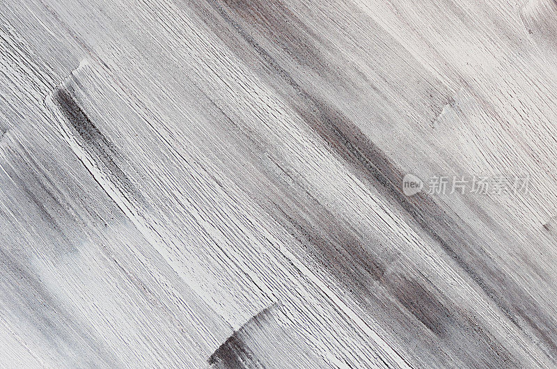 白色条纹破旧的油漆木板。木材纹理。