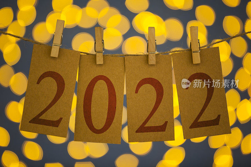 2022年新年概念剪接卡片和灯