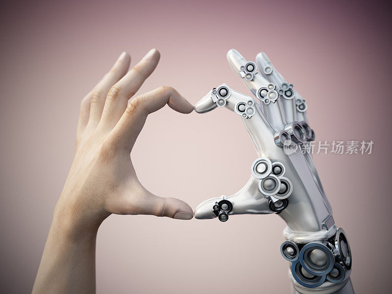 人和机器人的手一起形成一个心形。人工智能和人类协作概念