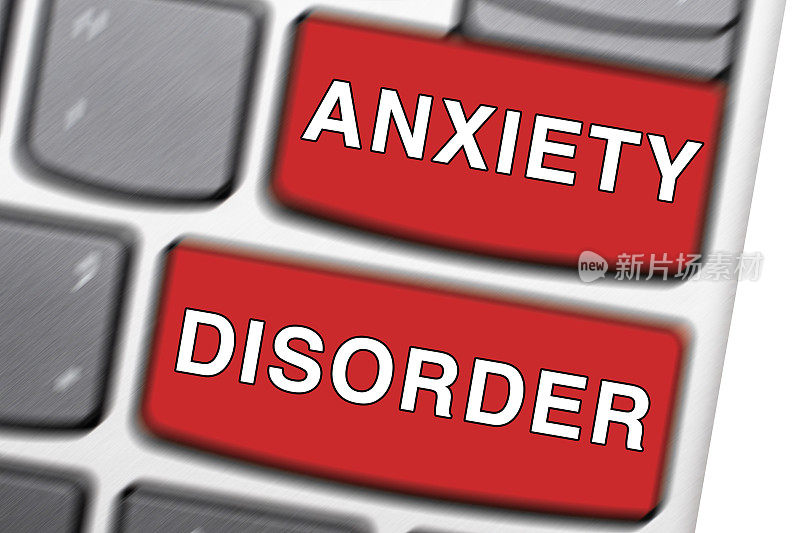 焦虑障碍的概念。电脑键盘有两个红色按键，带有文字焦虑障碍和放射状模糊效果。显著且不可控制的焦虑情绪概念