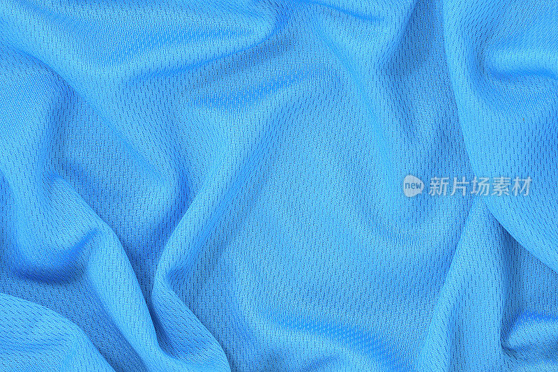 蓝色针织涤纶织物纹理背景，运动服背景。