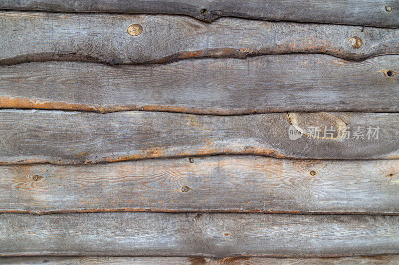 木材背景与木板覆盖彼此重叠在一起。木栅栏特写纹理。