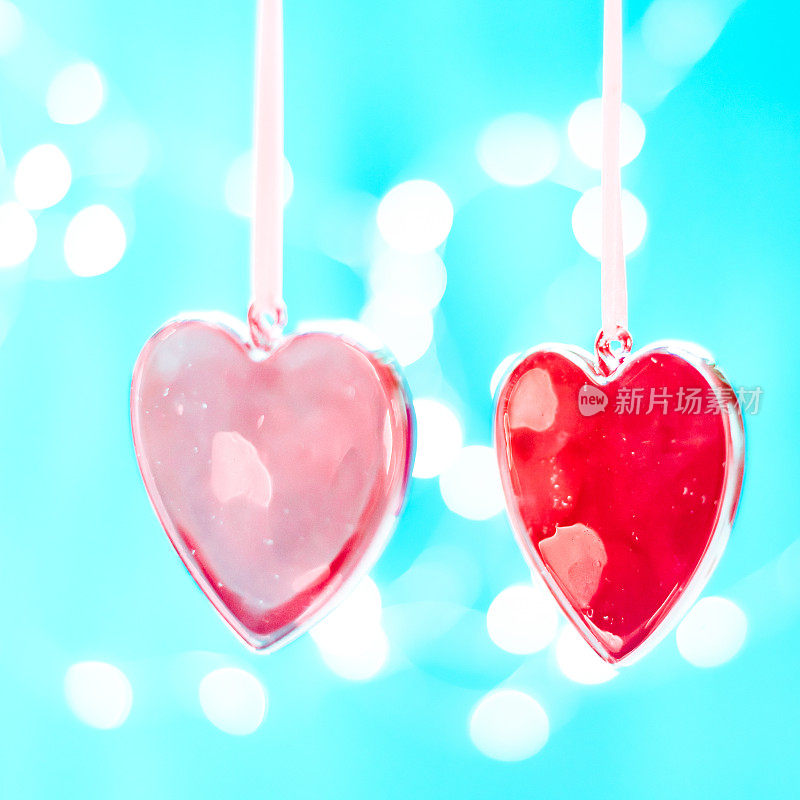 两颗红心作为背景。情人节的概念,。情人节贺卡