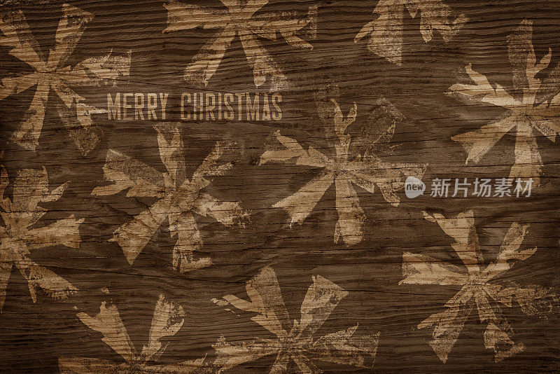 圣诞快乐，雪花在木制背景
