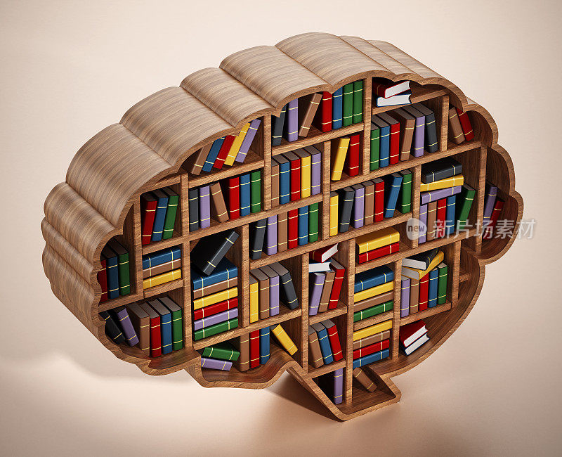 脑型图书馆的书架上摆放着一叠彩色书籍