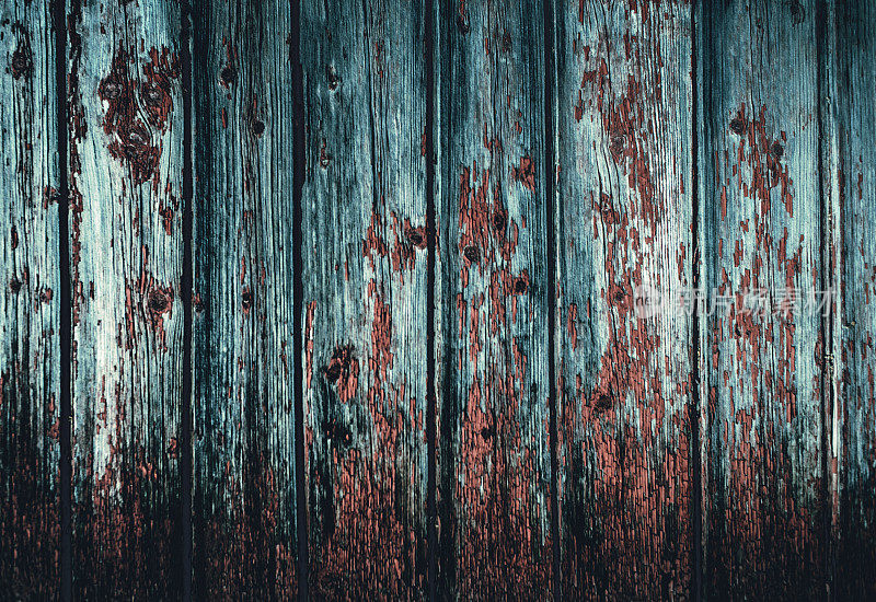 彩色的自然老脏的木墙背景与垂直木板。垃圾木墙用作背景