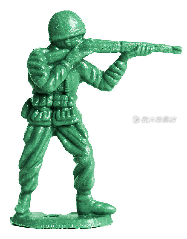 一个绿色的玩具兵正在用他的枪瞄准