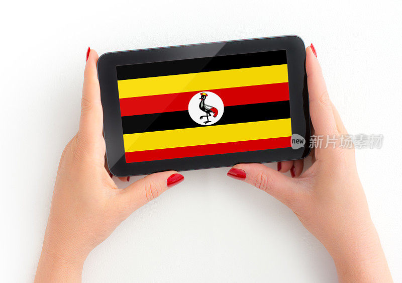 乌干达国旗数字平板电脑在成熟女性手中与个人观点