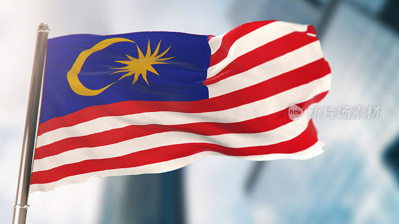 马来西亚国旗对抗散焦城市建筑