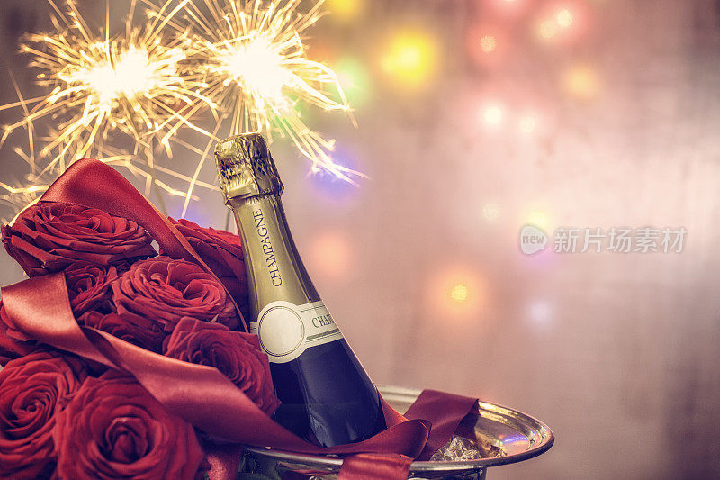 一束红玫瑰和一瓶香槟