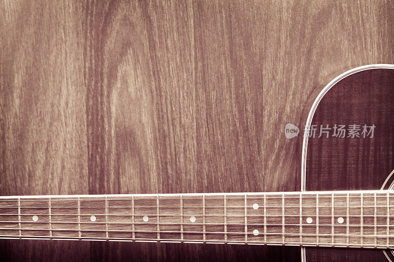 原声吉他，莫哈格尼指板细节与木材背景