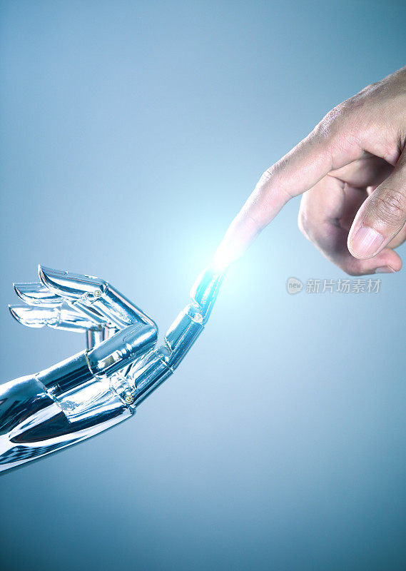 人类和机器人的手连接