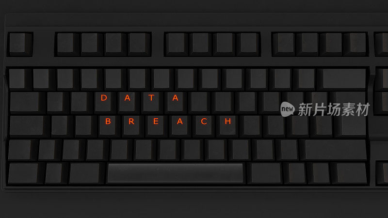 一个黑色键盘上发光的按键的特写拼写数据泄漏