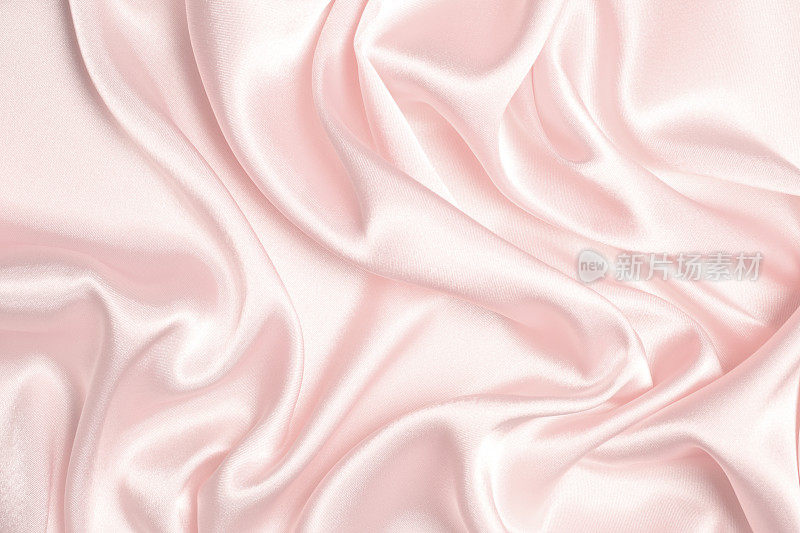 粉红色丝绸波浪纹理背景