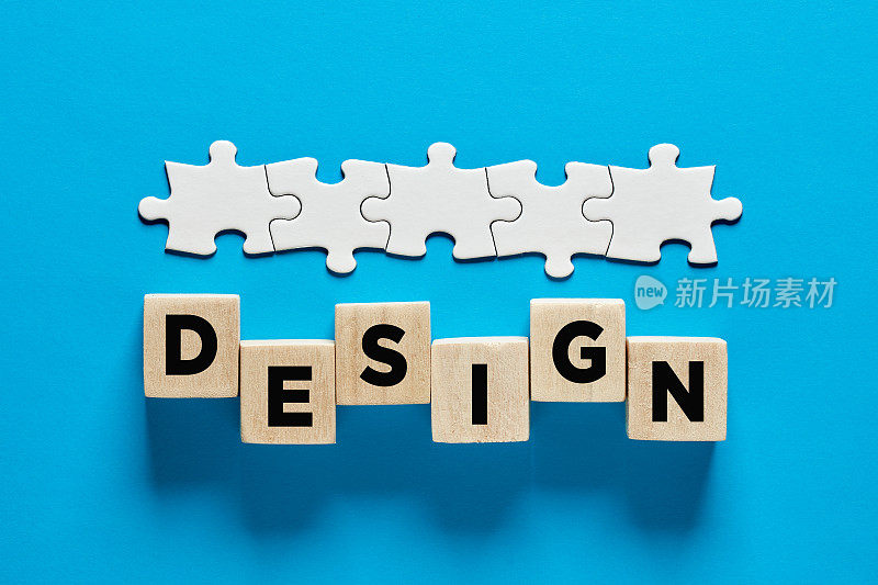 网页设计或平面设计业务或职业概念。字设计上用木方与连线的拼图。