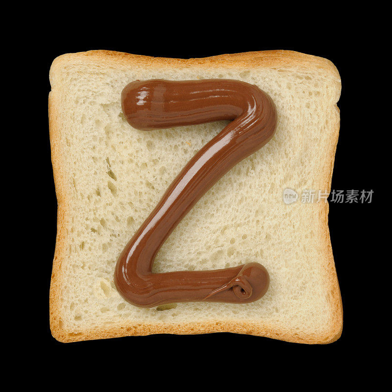 巧克力字母Z在锡箔面包片，黑色背景
