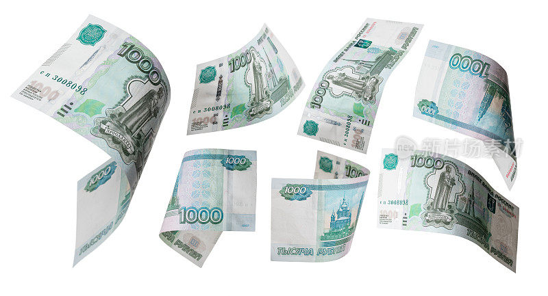 1000卢布在白底上飞舞。不同角度的俄罗斯钞票。