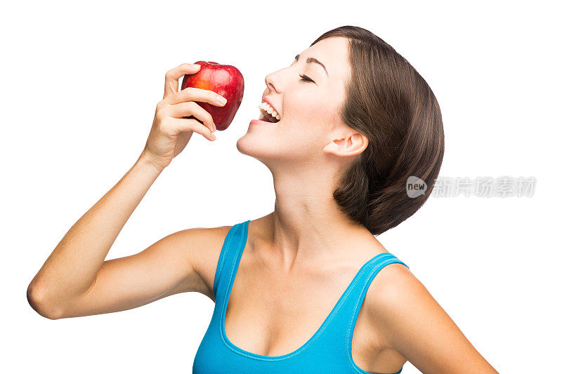 年轻女子在吃苹果