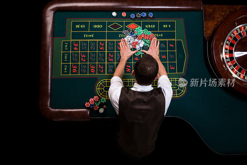 顶视图的赌场赌场和绿色轮盘赌桌。遗传算法