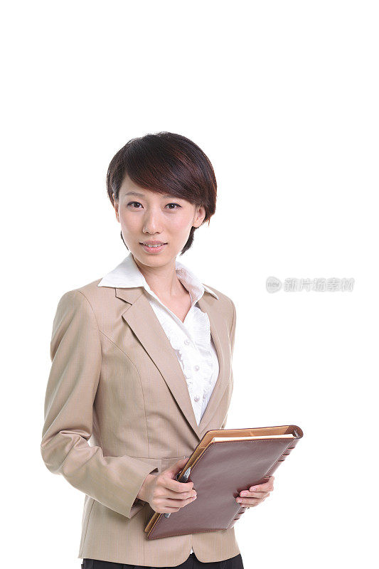 年轻的亚洲商业女性拿着文件夹