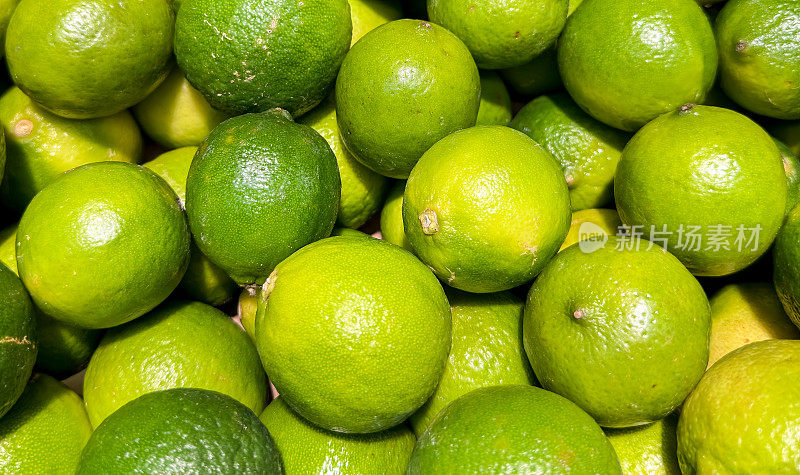 酸橙。绿色和成熟的酸橙主题。酸橙的背景。