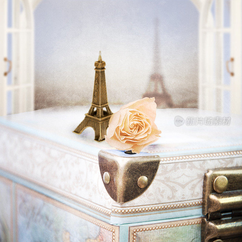 浪漫的背景，手提箱，玫瑰和埃菲尔铁塔。