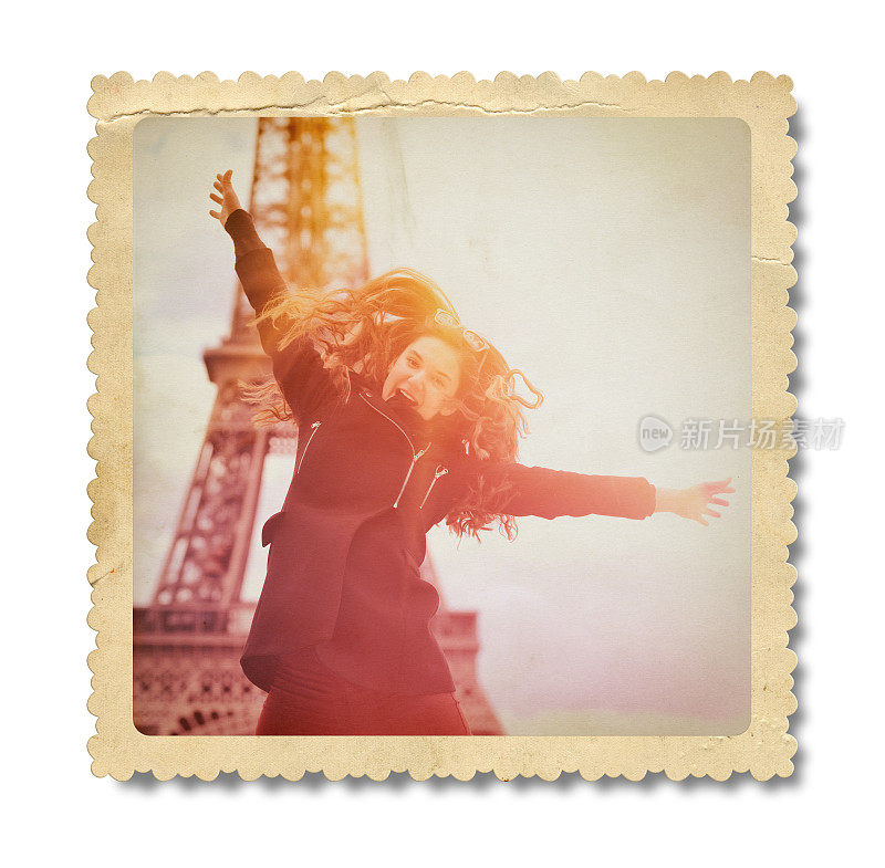 女孩在埃菲尔铁塔的背景上跳跃