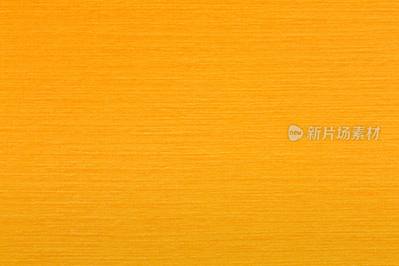 平滑的浅橙色毛毡织物背景纹理俯视图
