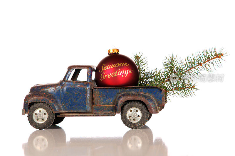 旧玩具卡车与节日问候圣诞小玩意