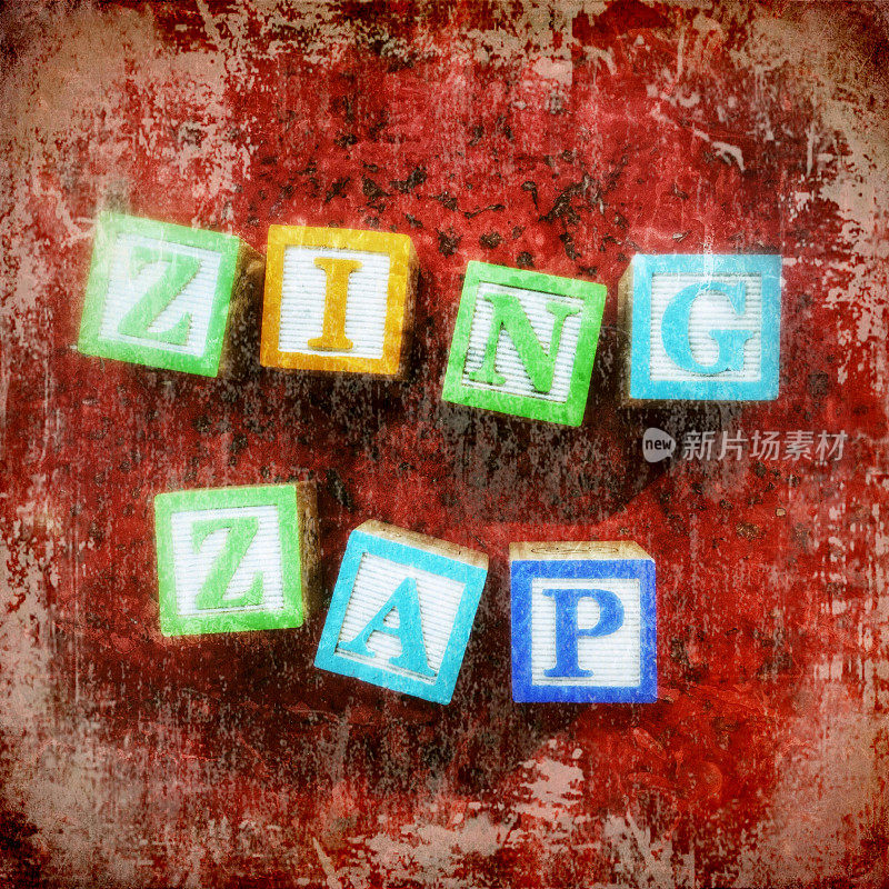 玩具积木拼写单词ZING和ZAP