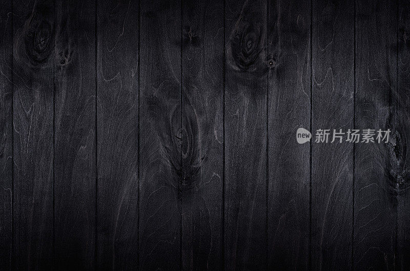黑色典雅的黑色木板背景。木材纹理。