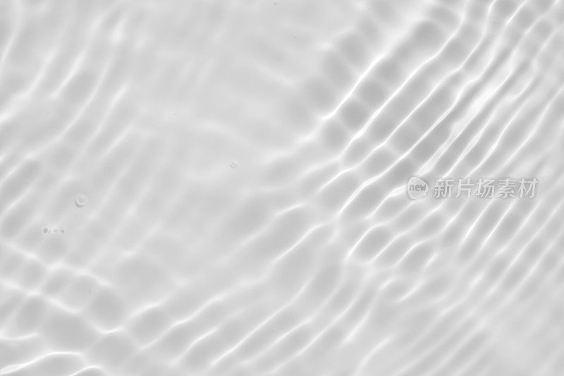 抽象的白色透明水影表面纹理自然波纹背景