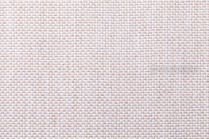 白色和米色纺织背景与格子图案，特写。