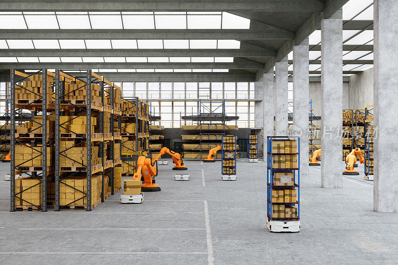 自动化机器人将纸板箱放在AGV上的配送仓库