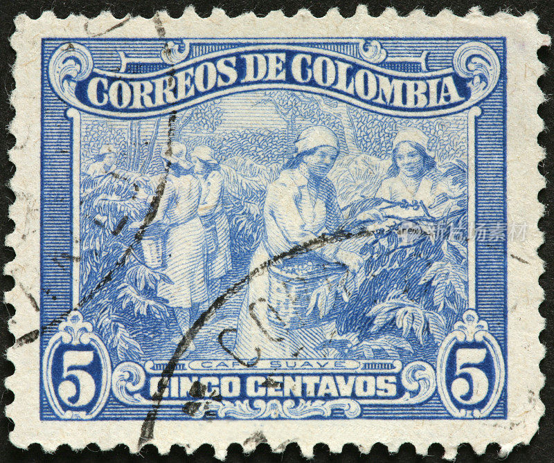 在古老的哥伦比亚邮票上采摘咖啡的女人