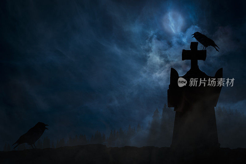 夜晚的墓碑和乌鸦背景