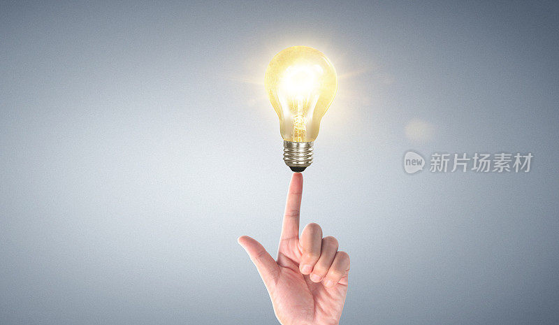 手握照明灯泡，创意，创新灵感理念