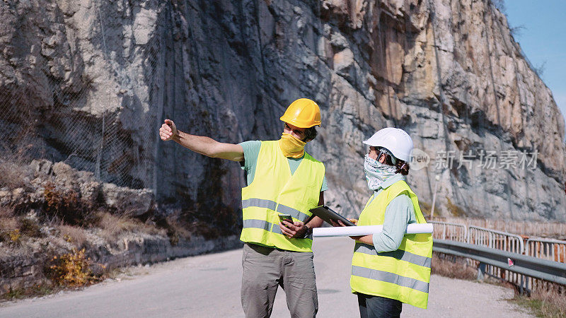 道路建设工程师的工作。在COVID-19大流行期间修建新的公路。