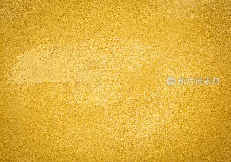 斑驳的黄色墙壁纹理