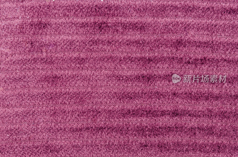 深紫色的织物纹理背景