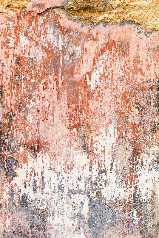 老西西里墙的背景纹理:邋遢斑驳的粉-黄-橙