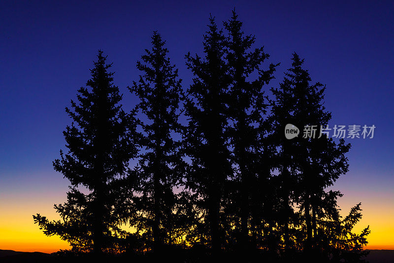 黄昏日落风景山景与剪影树木