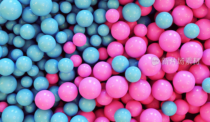 粉红色和蓝色的球堆反映了性别和颜色的多样性