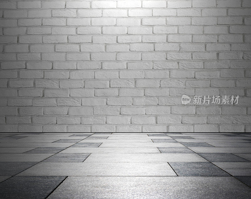 白色空砖墙和混凝土地板