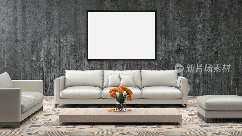 灰色墙壁上的空白相框，前面是沙发