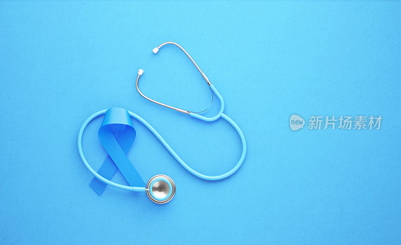 蓝色背景的前列腺癌意识带和听诊器