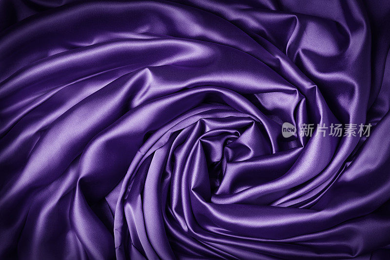 丝绸布料漩涡螺旋背景，紫色漩涡织物结，抽象缎窗帘
